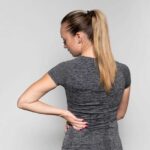 Почему болит спина при месячных и как снять боль: причины и рекомендации